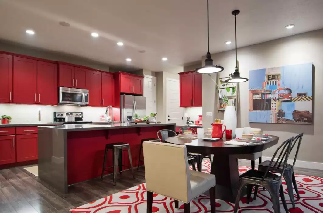 Modern red kitchen with large floor layout