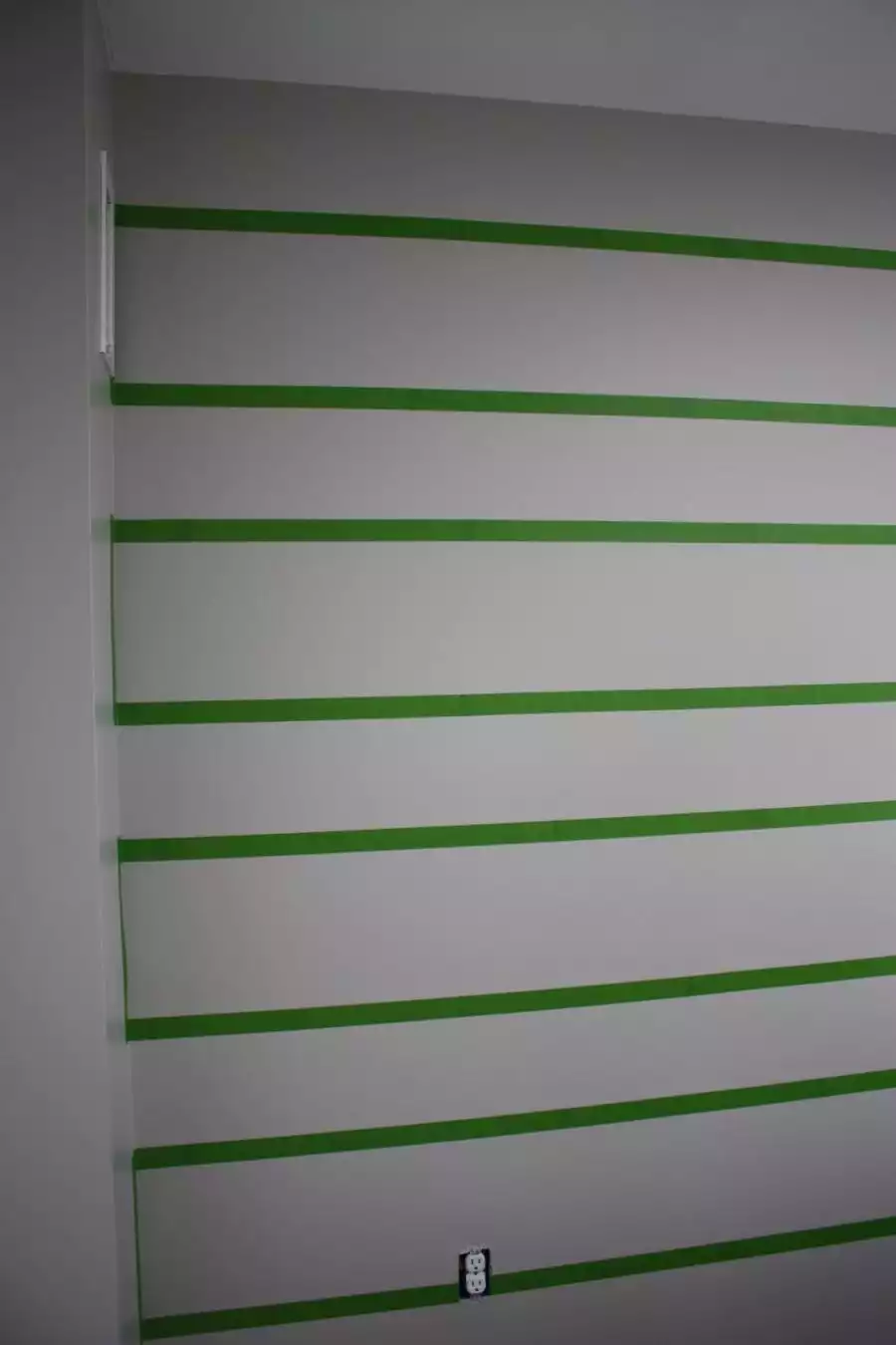 Prepare the wall with tape