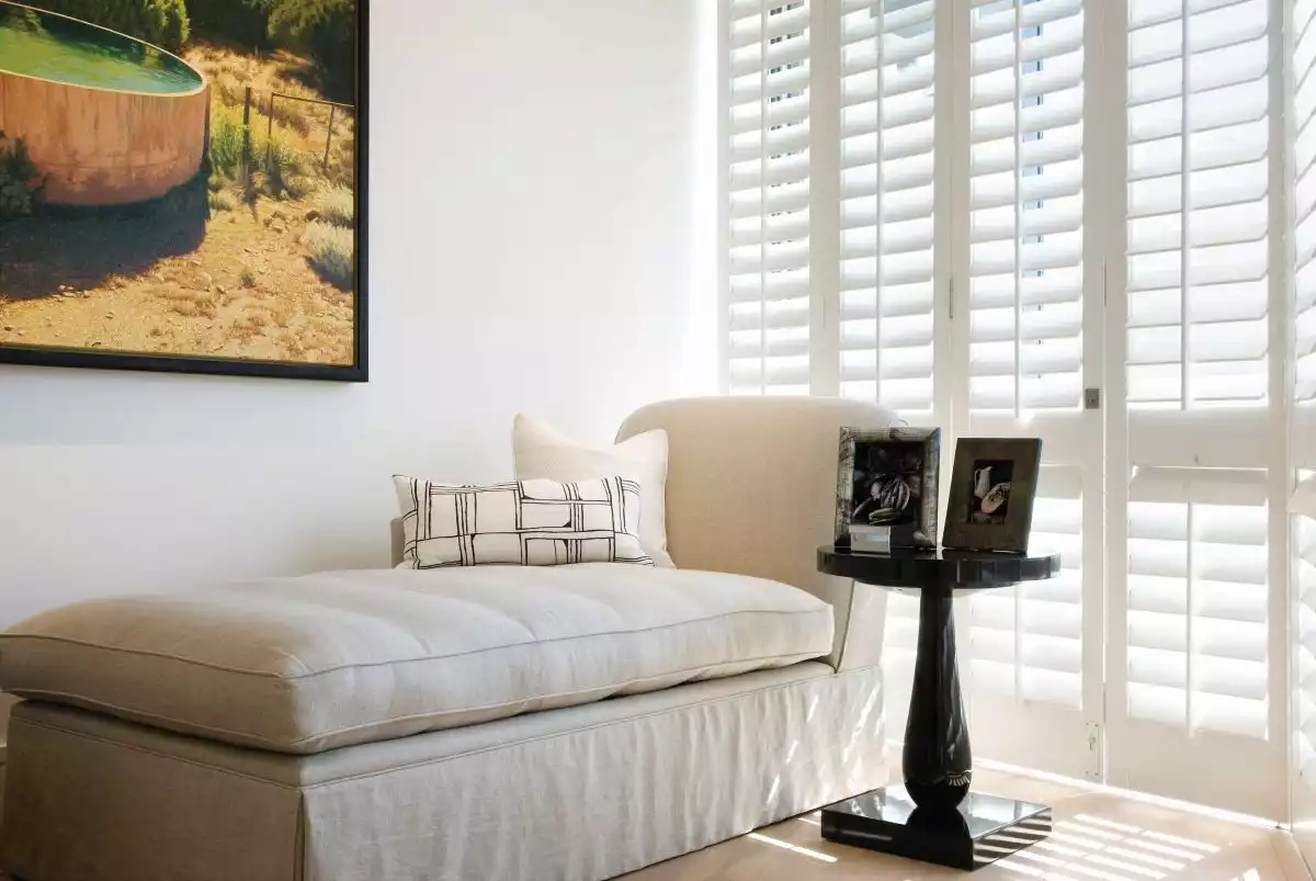 Cozy nooks with comfortable seating and accent tables serve as comfortable reading spaces