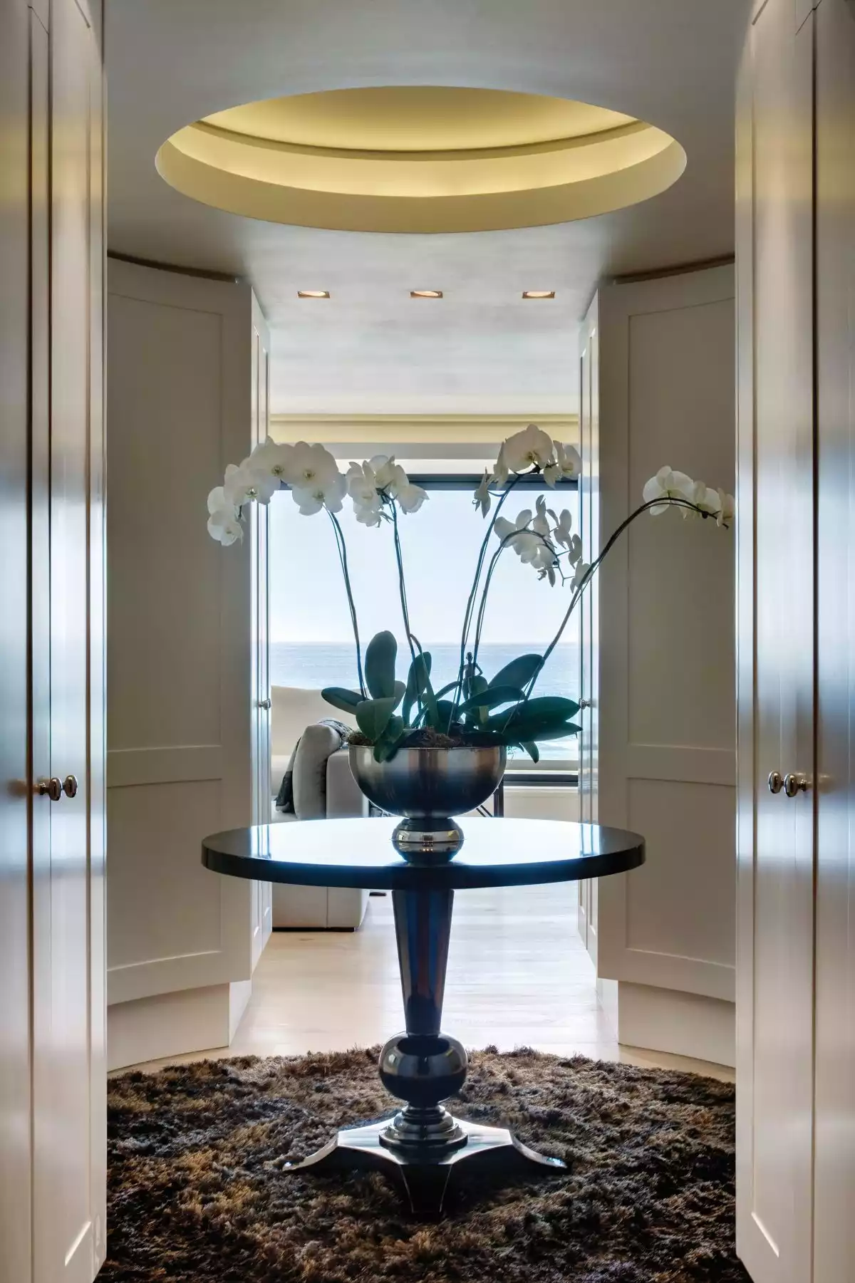 A circular lobby just off the master suite features an opening in the ceiling with built-in mood lighting