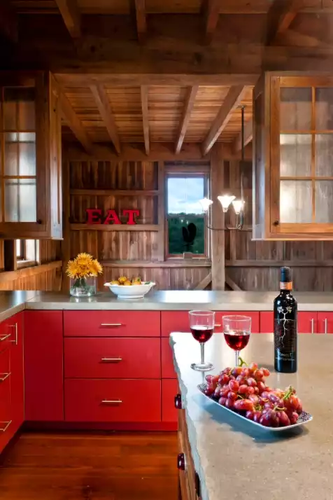 Rustic kitchen with red cabinets