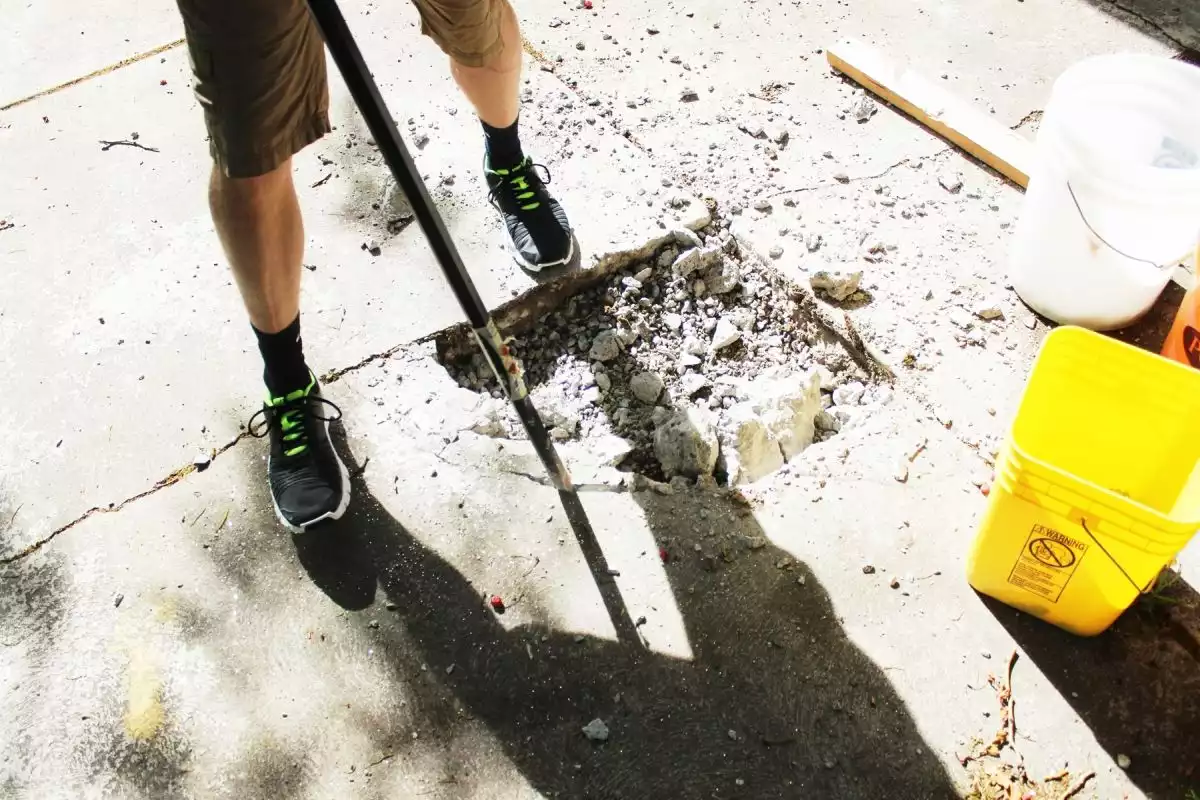 Best Way to Remove Concrete Slabs on a Patio more pry bar
