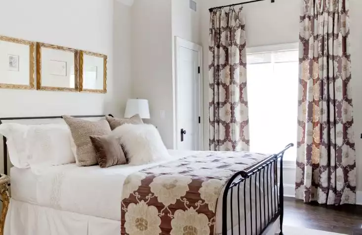Traditional black bedroom bed with a cozy feel