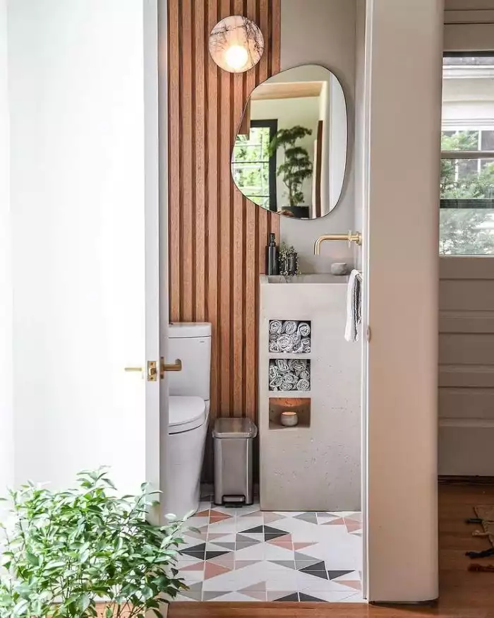 Bathroom cabinet with oval mirror