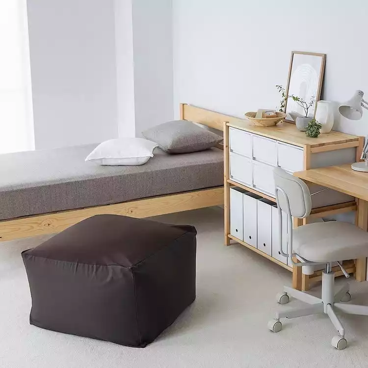 Single bed with small closet and desk