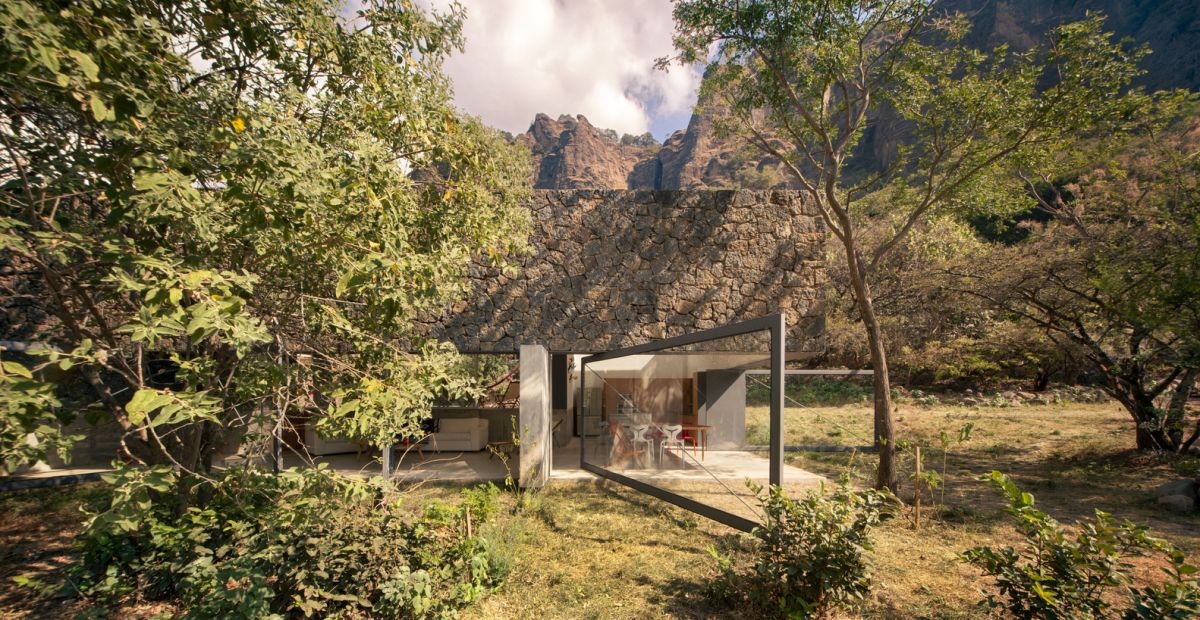 A rough stone house that blends into the landscape