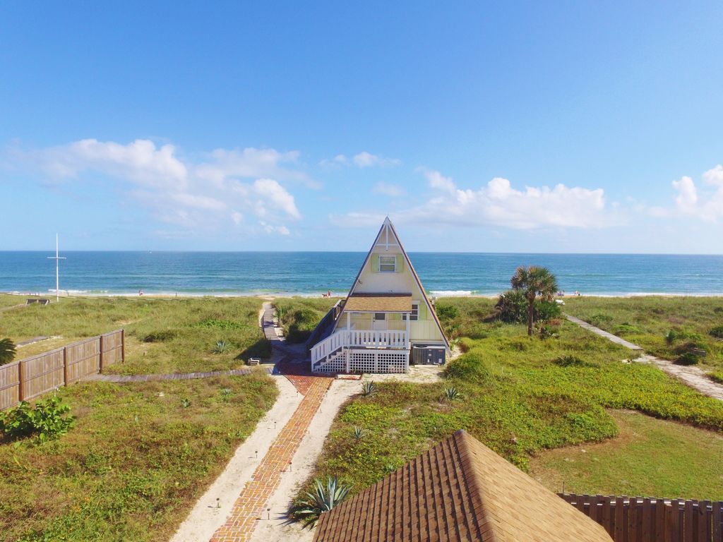 A frame cabin beach view