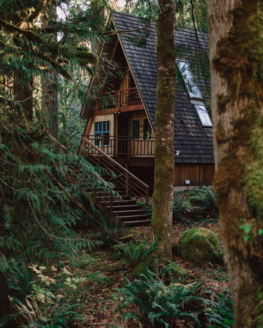 A frame cabin two story balcony