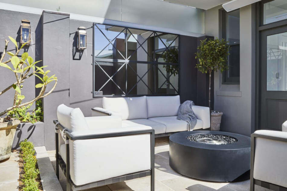 A heritage restoration with contemporary cool fire pit
