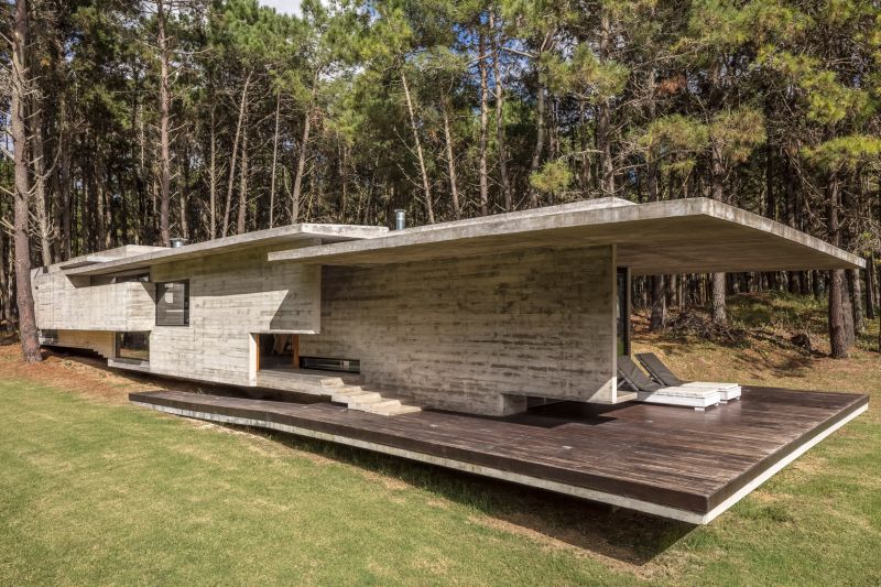 A summer house made out of concrete side view