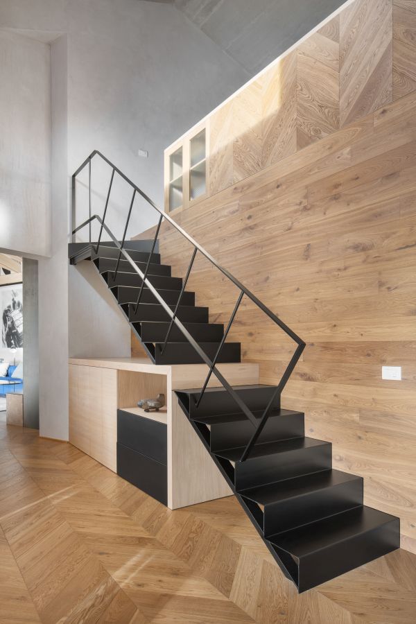 A unique staircase and furniture duo