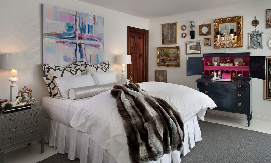Abstract canvas art above the bed