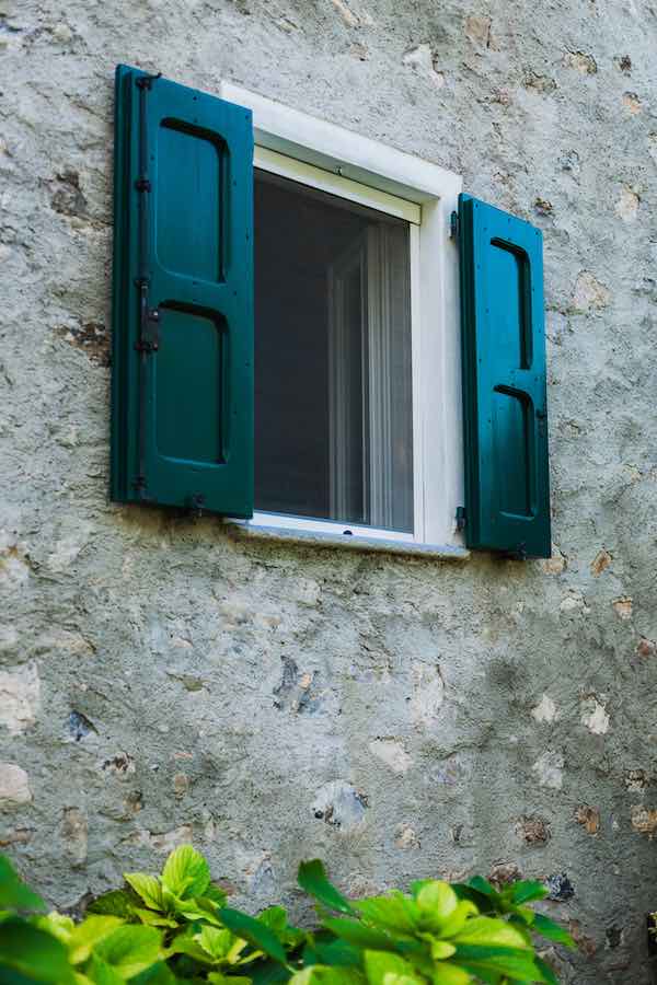 Accent The Exterior Of Your Home With Peacock Blue Shutters