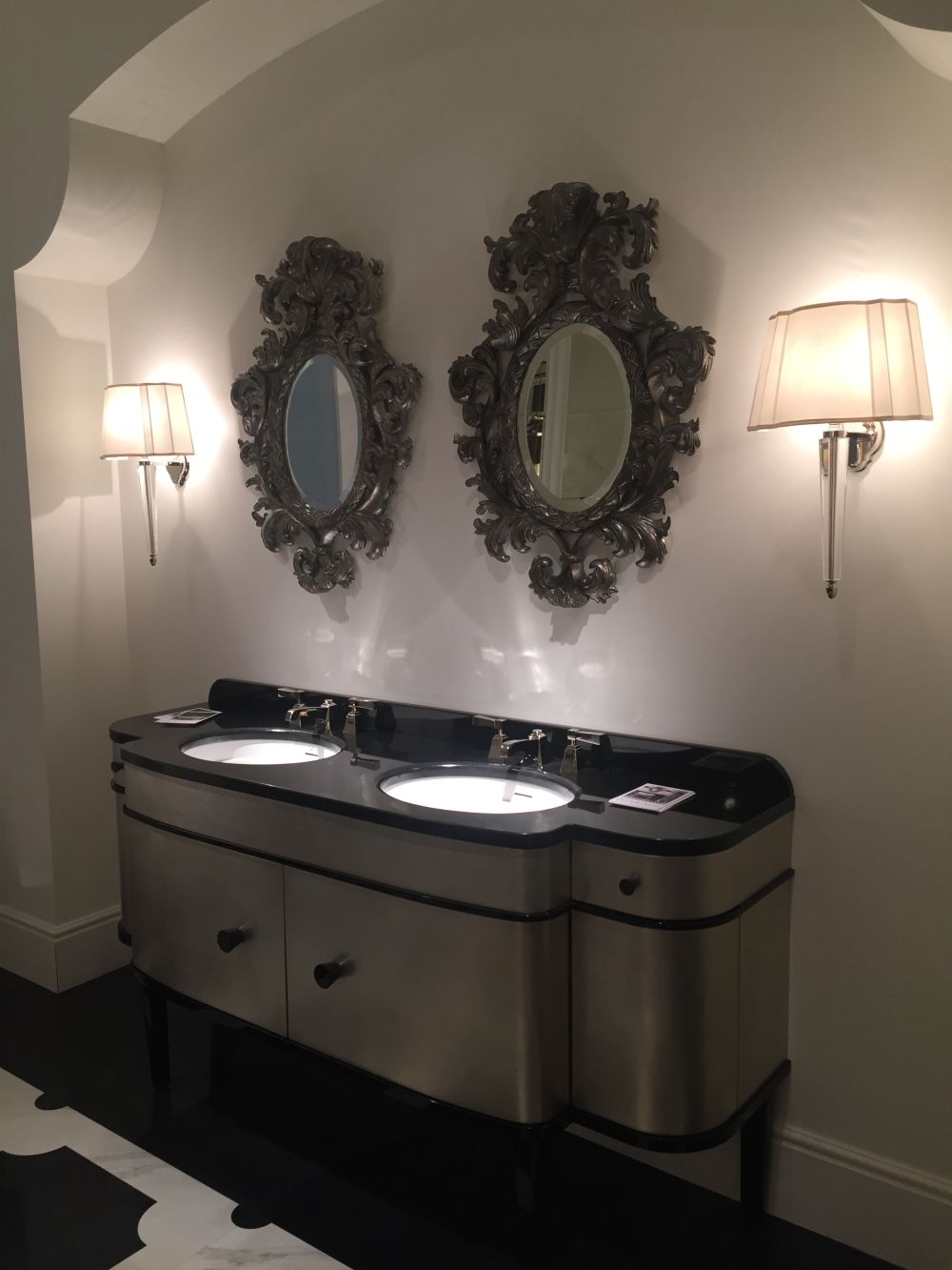 Add a luxury feel to the bathroom with black victorian accents