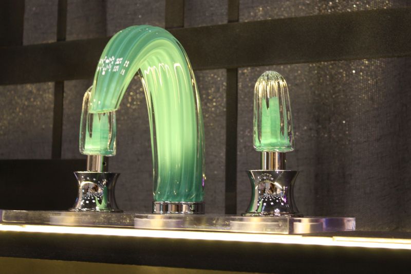 Add color to bathroom through faucets