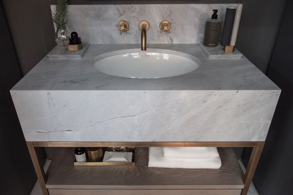 Add storage under the bathtoom wash basin