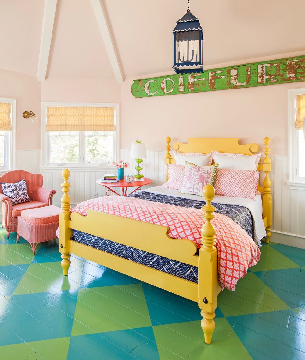 Alison Kandler bedroom interior design with yellow bed and painted furniture