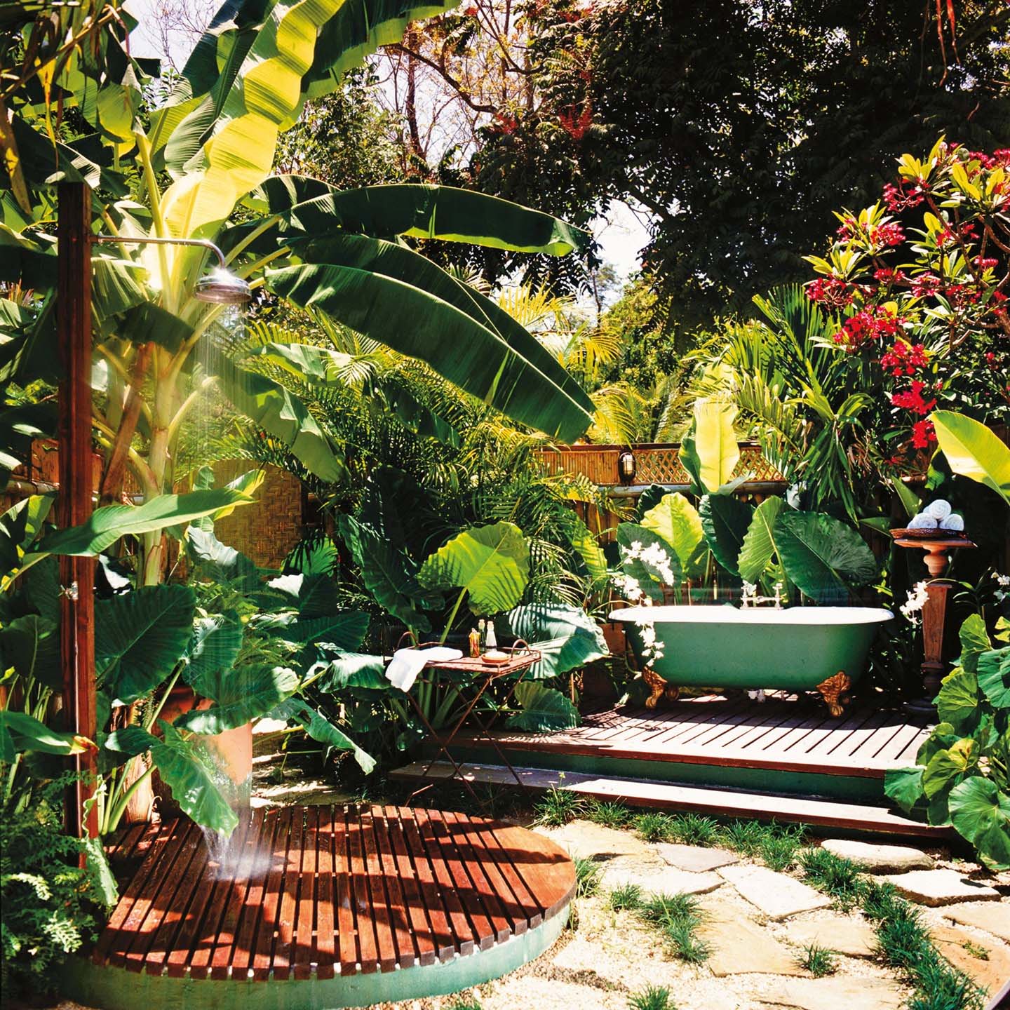 Amazing backyard outdoor bathroom with shower and freestanding tub