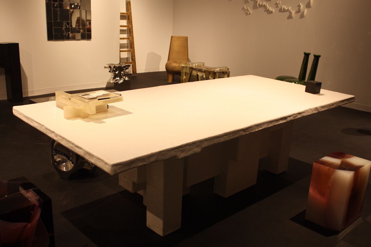 What may look like a typical table, this piece is actually a honeycomb structure made of corrugated cardboard that is covered with fiberglass and polyester resin.