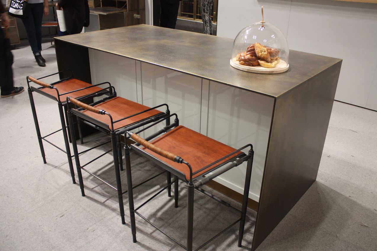 This kitchen island area from Ammuneal features four distinctly different materials.