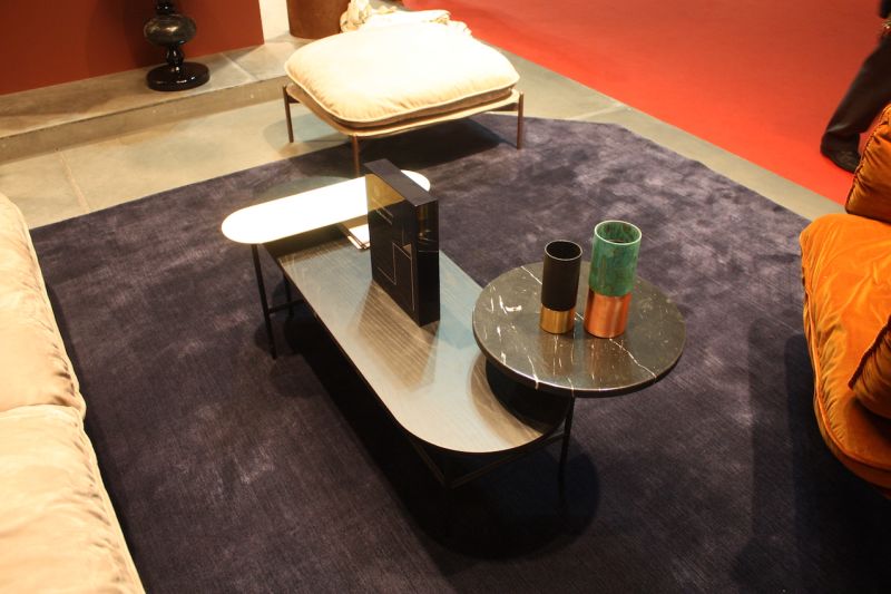 A connected set of smaller pieces makes for an interesting and functional coffee table from &Tradition. The Palette Table designed by Spanish designer Jaime Hayon is made of brass, black Nero Marqina marble, and black stained ash.