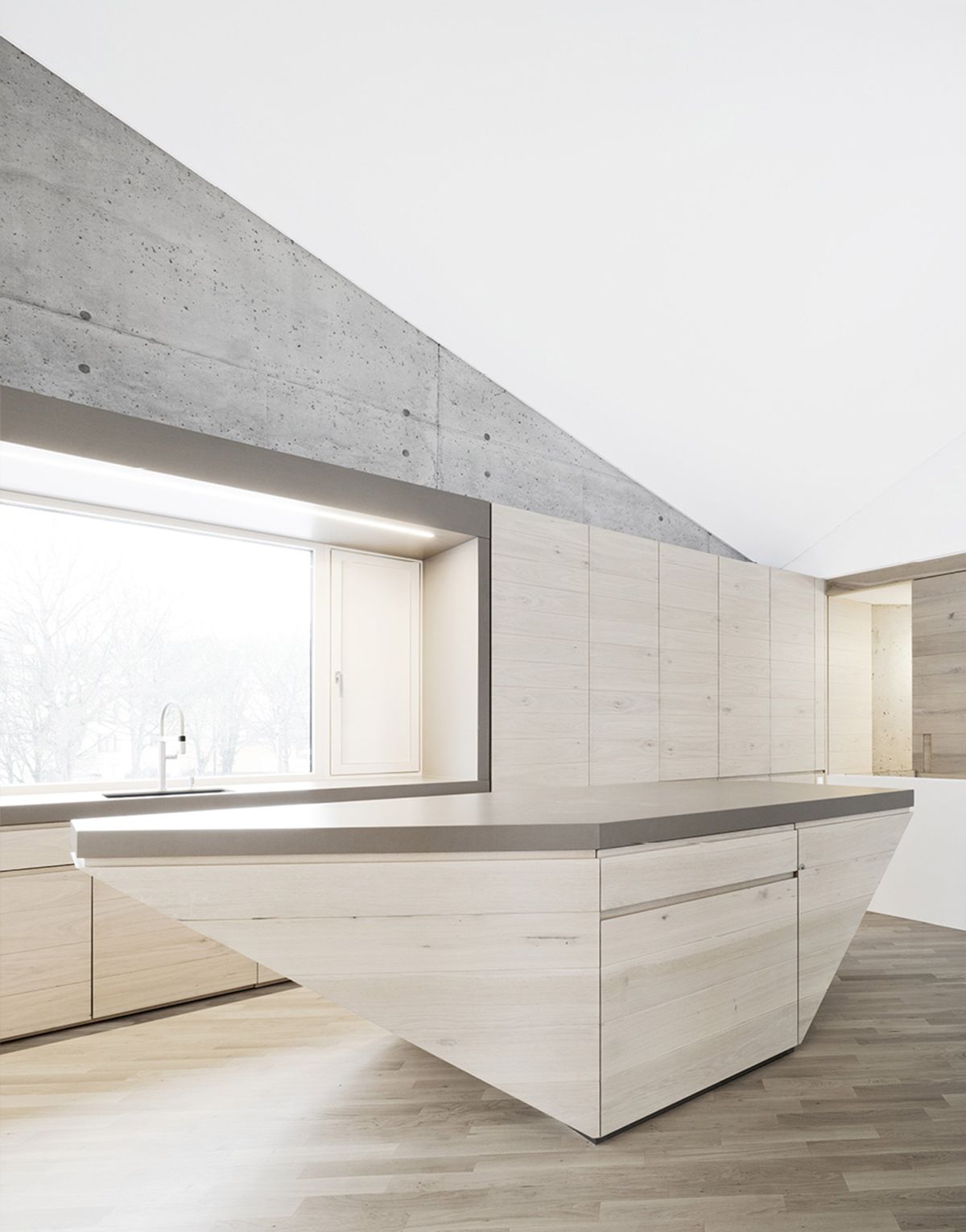 Angular concrete house design Kitchen island