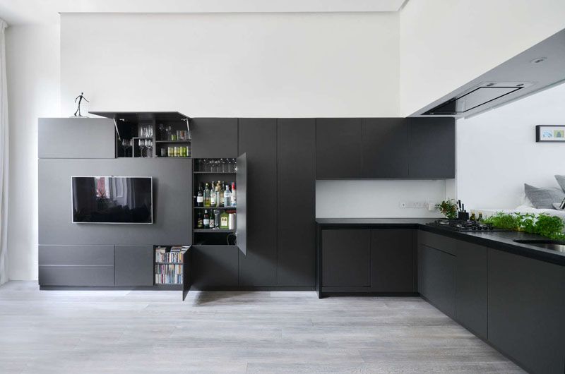 Apartment featuring a black open kitchen