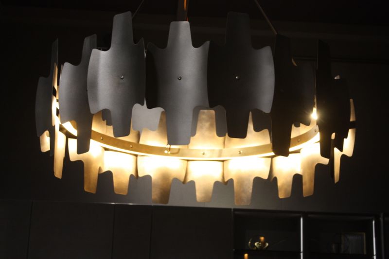 The dark and jagged kitchen chandelier shown by Ar-Tre is a dramatic choice for kitchen lighting. The interior's metallic finish only enhances the dark exterior and unusual shape.