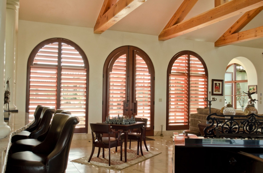 Cover Your Window with Arched Plantation Shutters