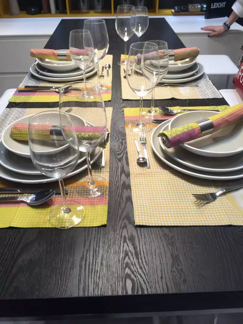 Arrange plates on table