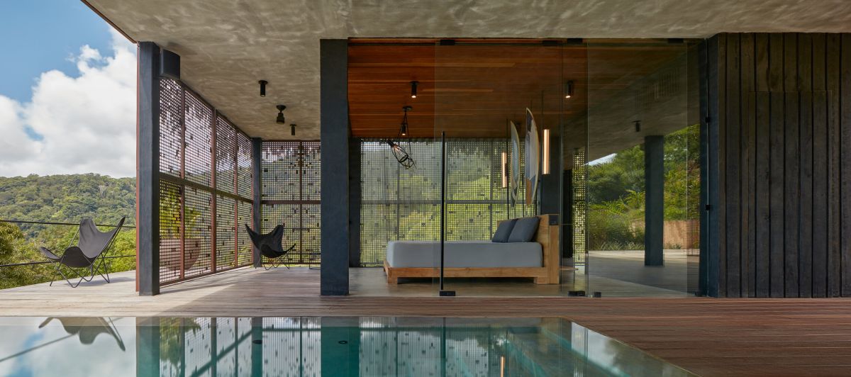 Atelier Costa Rica house with Green Roof by Formafatal concrete ceiling perforated walls