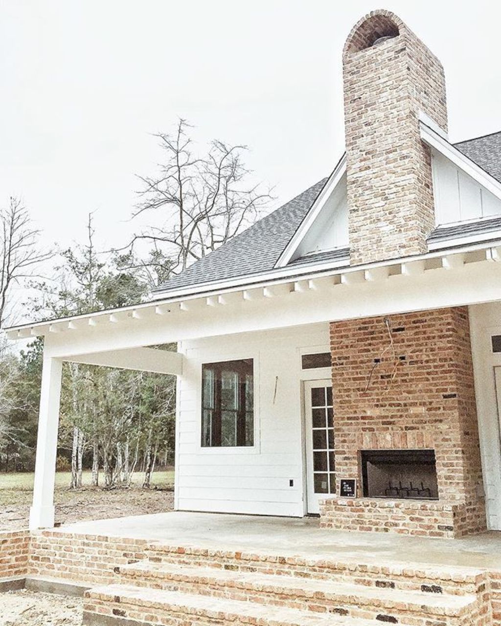 Back porch brick fireplace