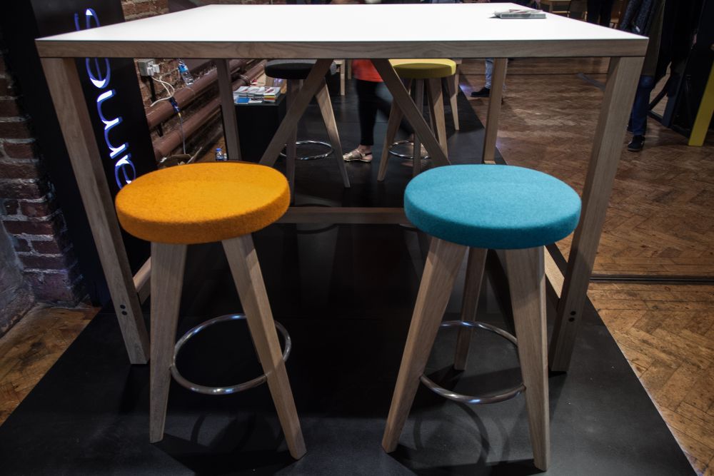 Backless colorful stool with felt seat in orange and blue