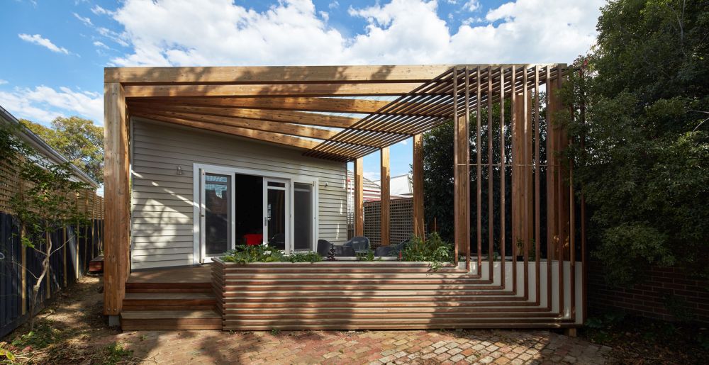 Backyard pergola porch design with a modern look