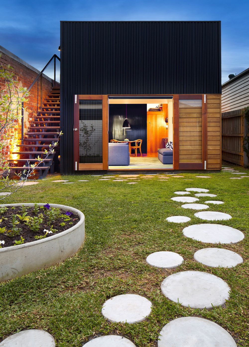 Backyard with concrete lawn pathways