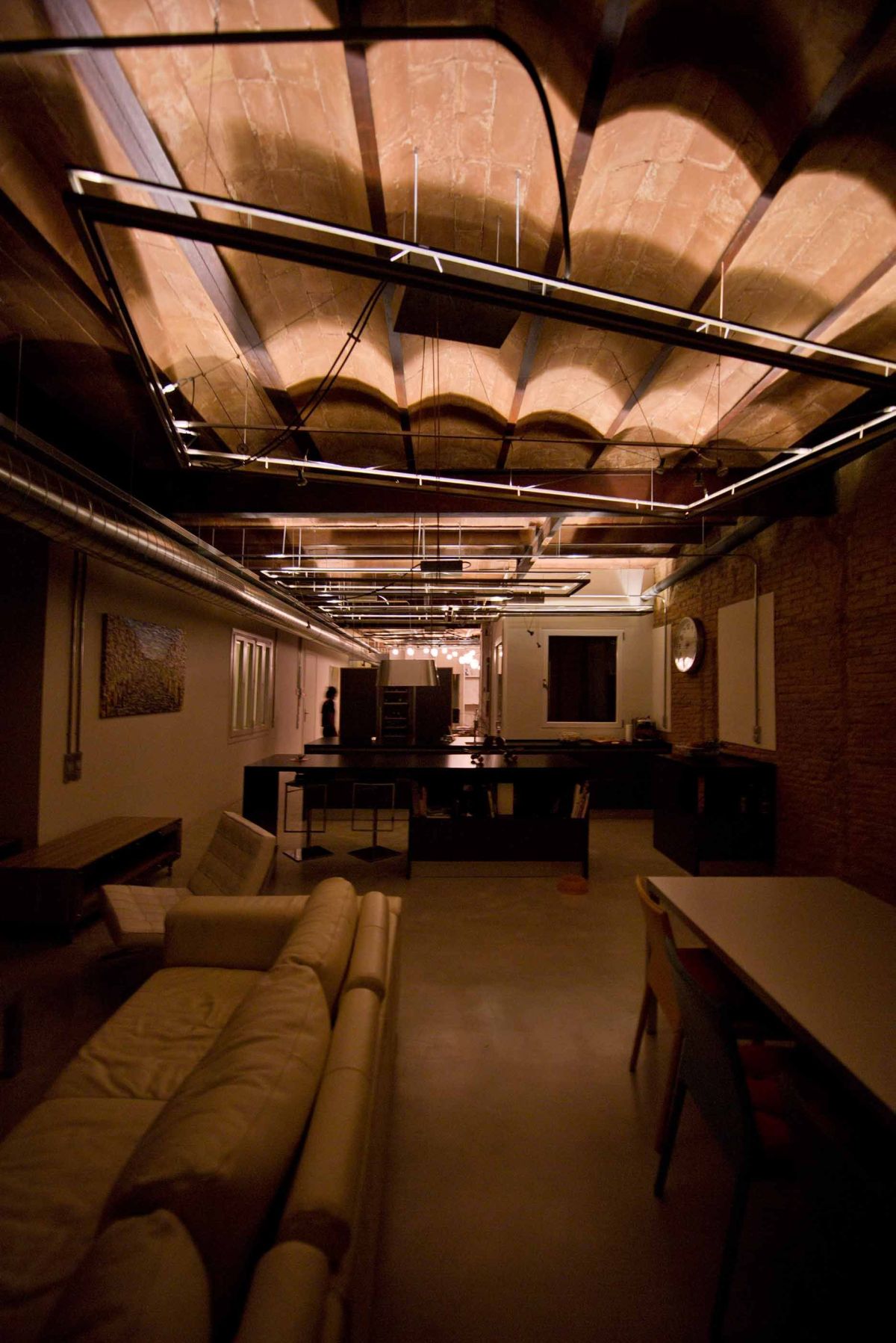 This long view of the apartment highlights the ceiling and the effect of the "lighting carpets."