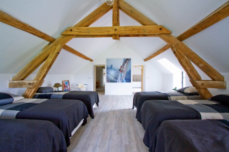 Barn Conversion in Burgundy Attic Bedroom