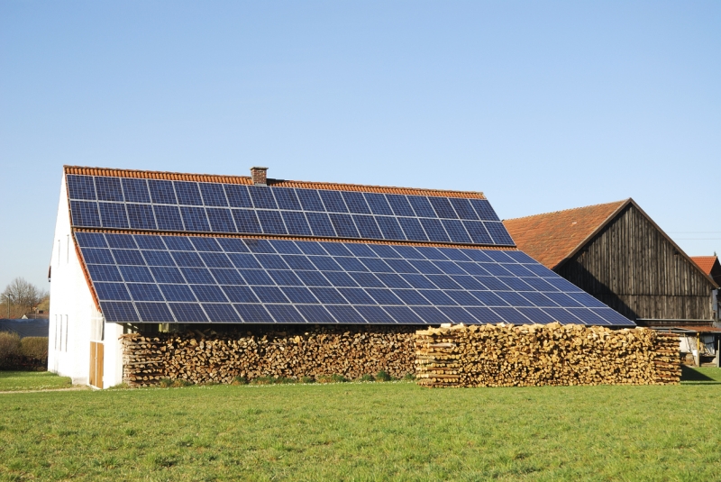 Barn house with solar panels