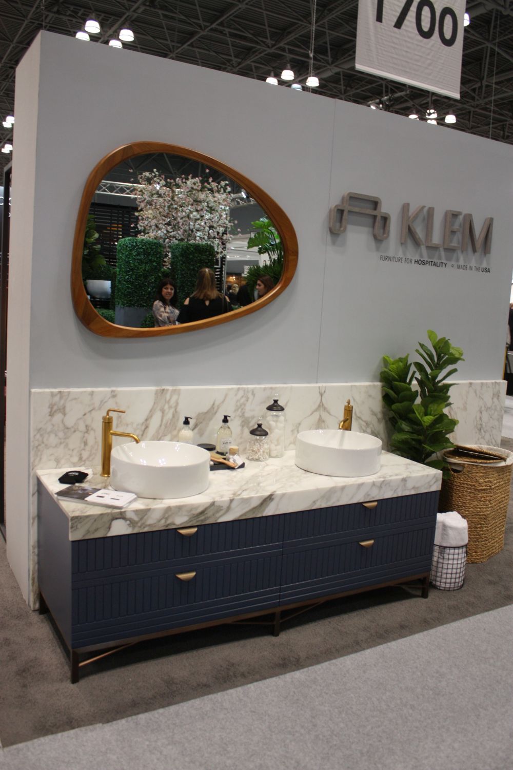 Bathroom design with marble accents and copper faucets