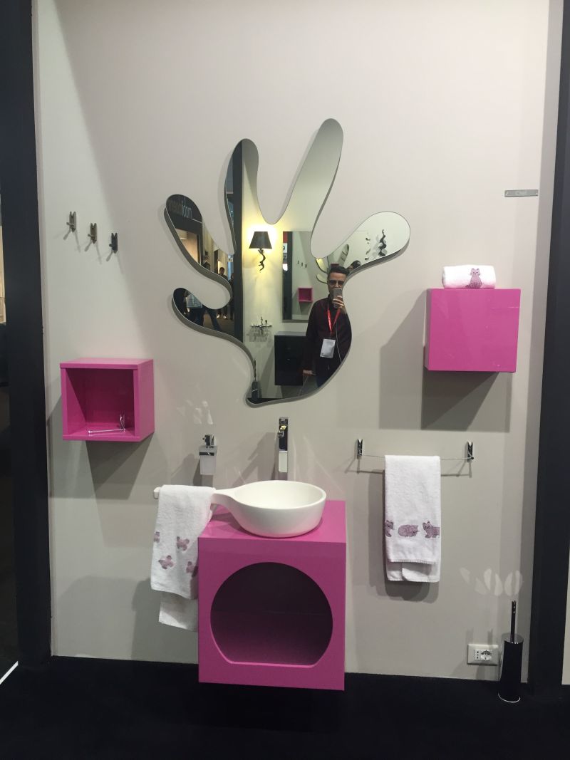 Bathroom designed for kids with pink accents