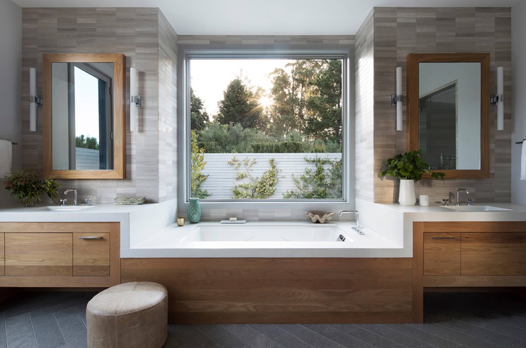 Bathroom featuring a build in bath tub