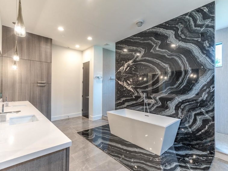 Bathroom with Matched Granite Slabs 