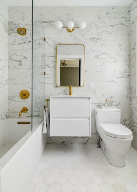 Bathroom with brass accents