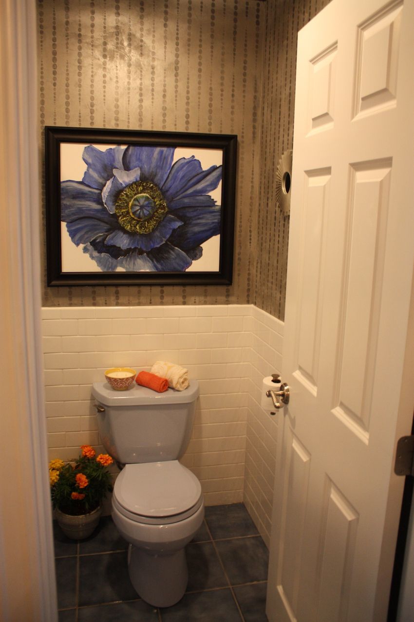 Bathroon toilet room with wall art above