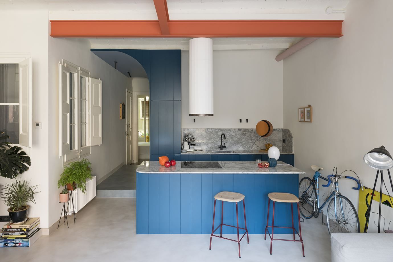 Beadboard blue kitchen island and marble countertop