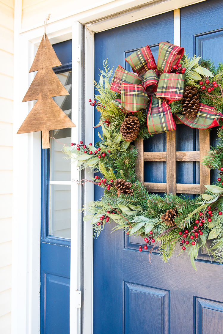 Basic DIY Christmas wreath customized with seasonal ornaments