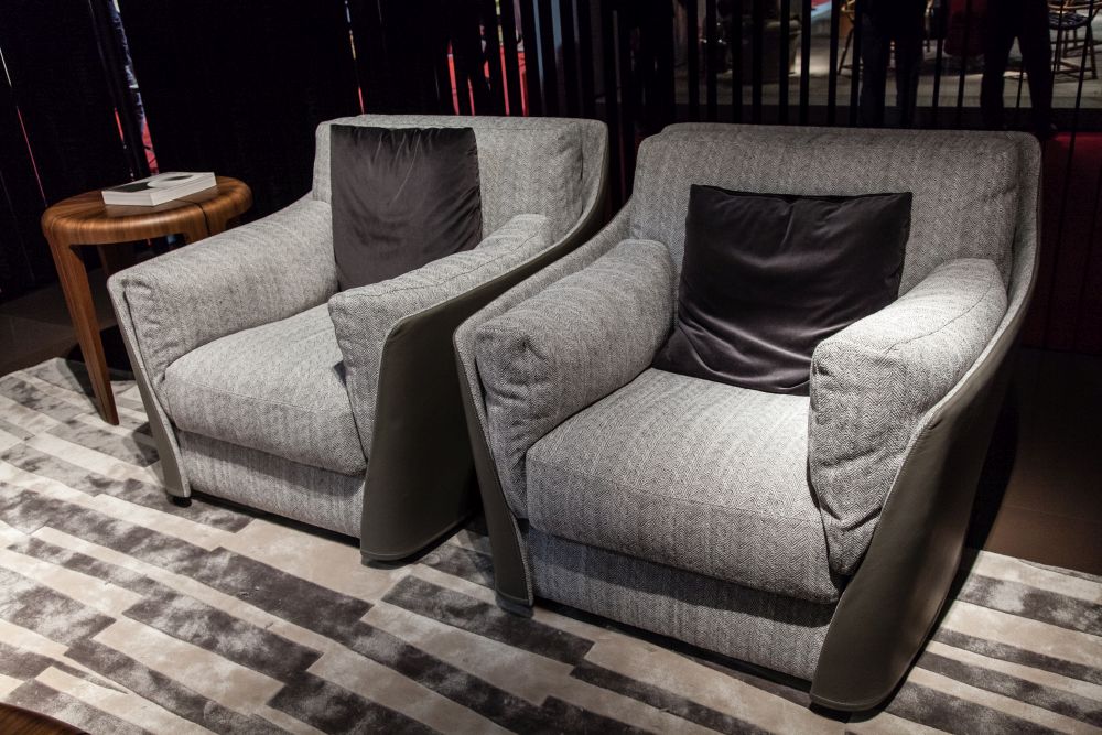 You can use one of the armchairs and side tables in the living room as a reading nook setup 