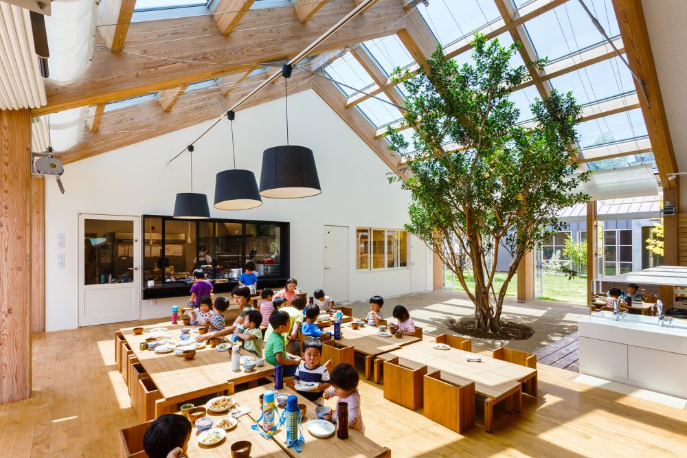 Beautiful nursery school with natural light and tree