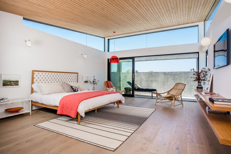 Bedroom featuring a balcony corner