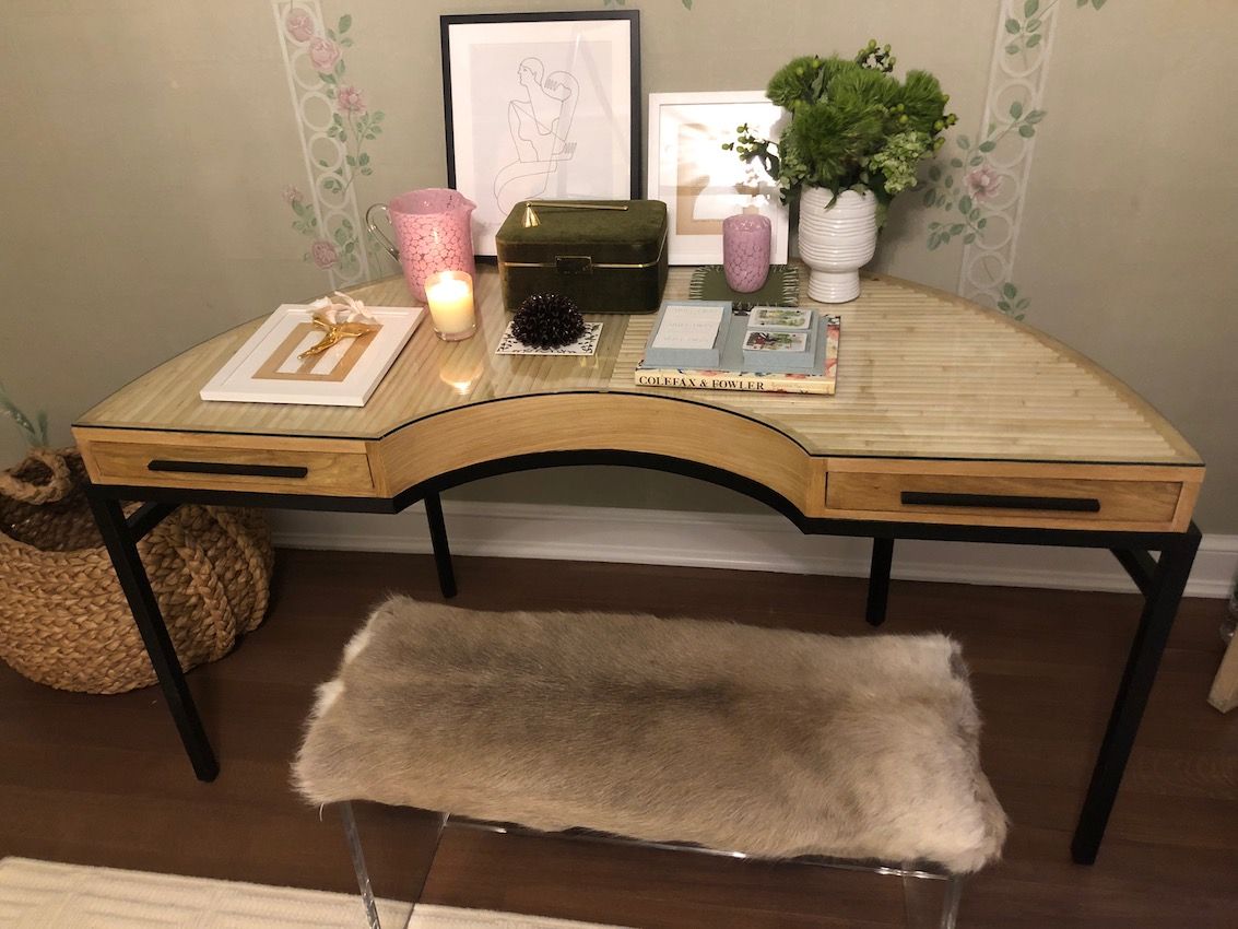 A unique half-circle desk from CB2 can be a dressing table or a writing table.